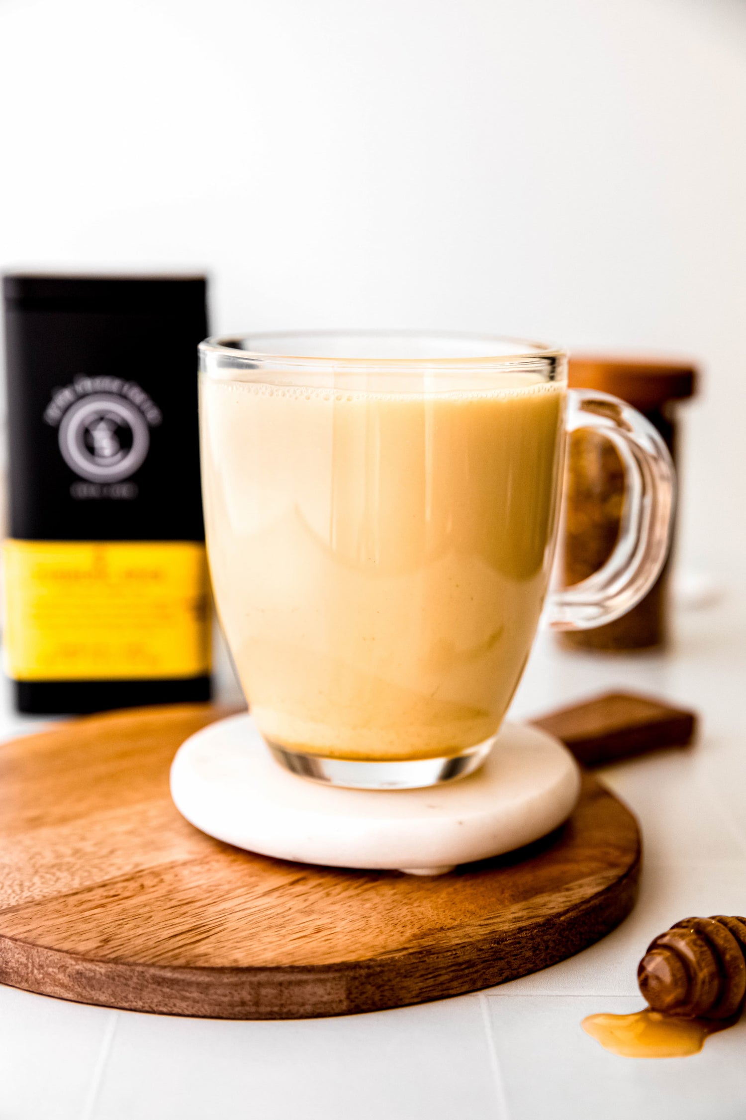 Golden milk turmeric latte in a ceramic mug, made with organic Turmeric Spice rooibos tea by Yerba Buena Tea Co.