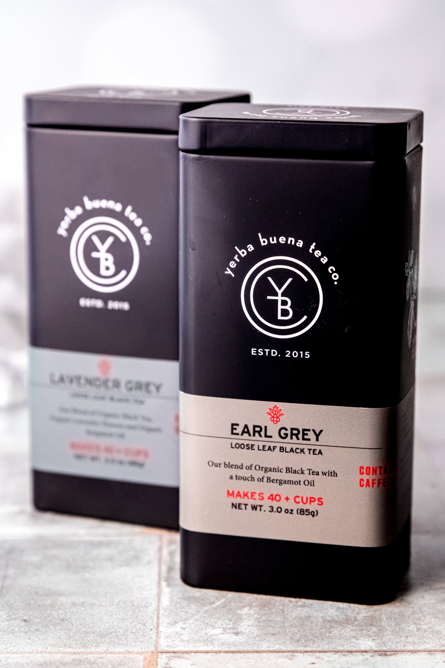 Organic Earl Grey and Lavender Grey black tea tins made with real cold-pressed bergamot oil, by Yerba Buena Tea Co.