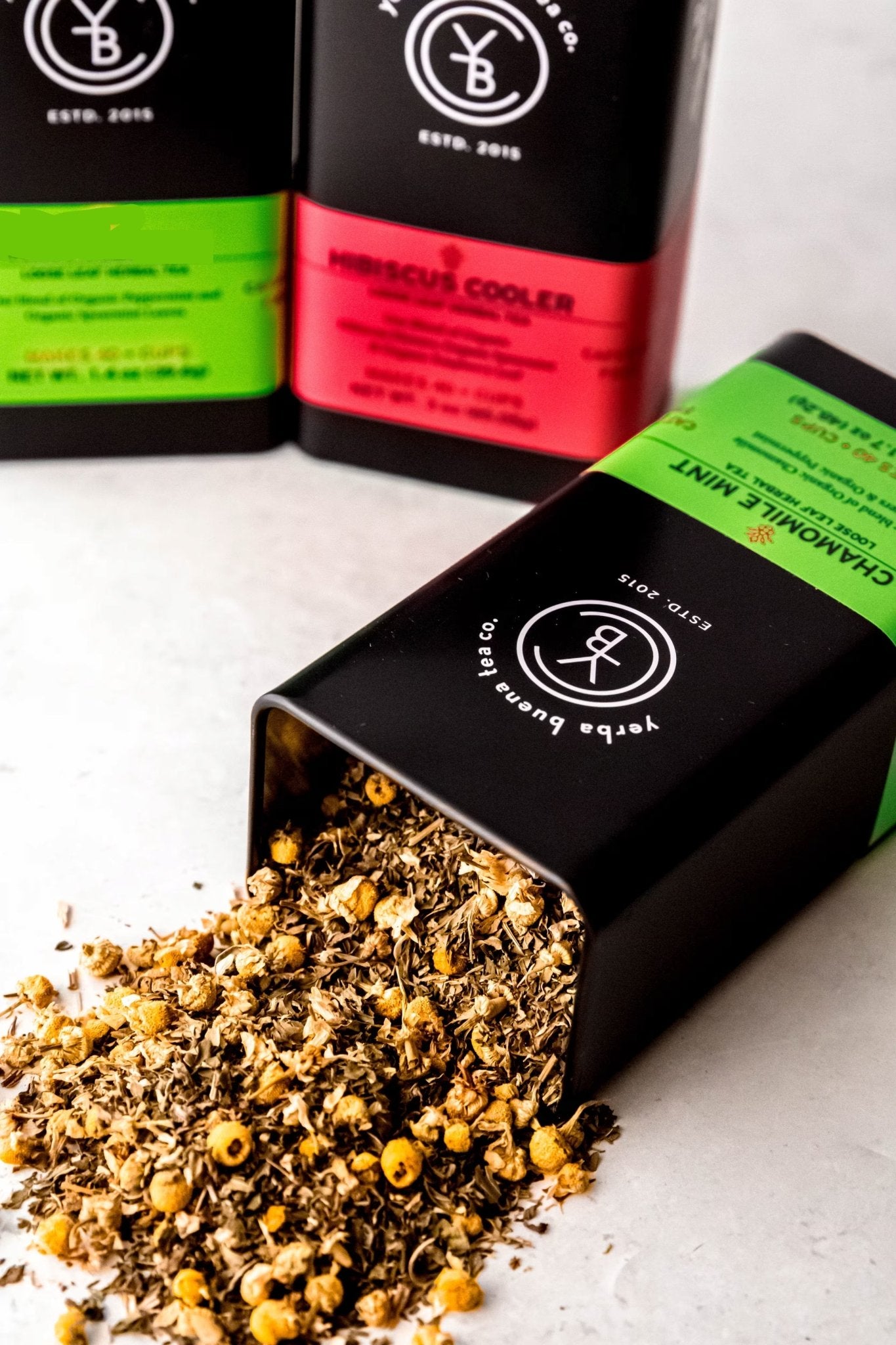 Organic digest and detox teas with ginger, peppermint, and dandelion root in glass teacups