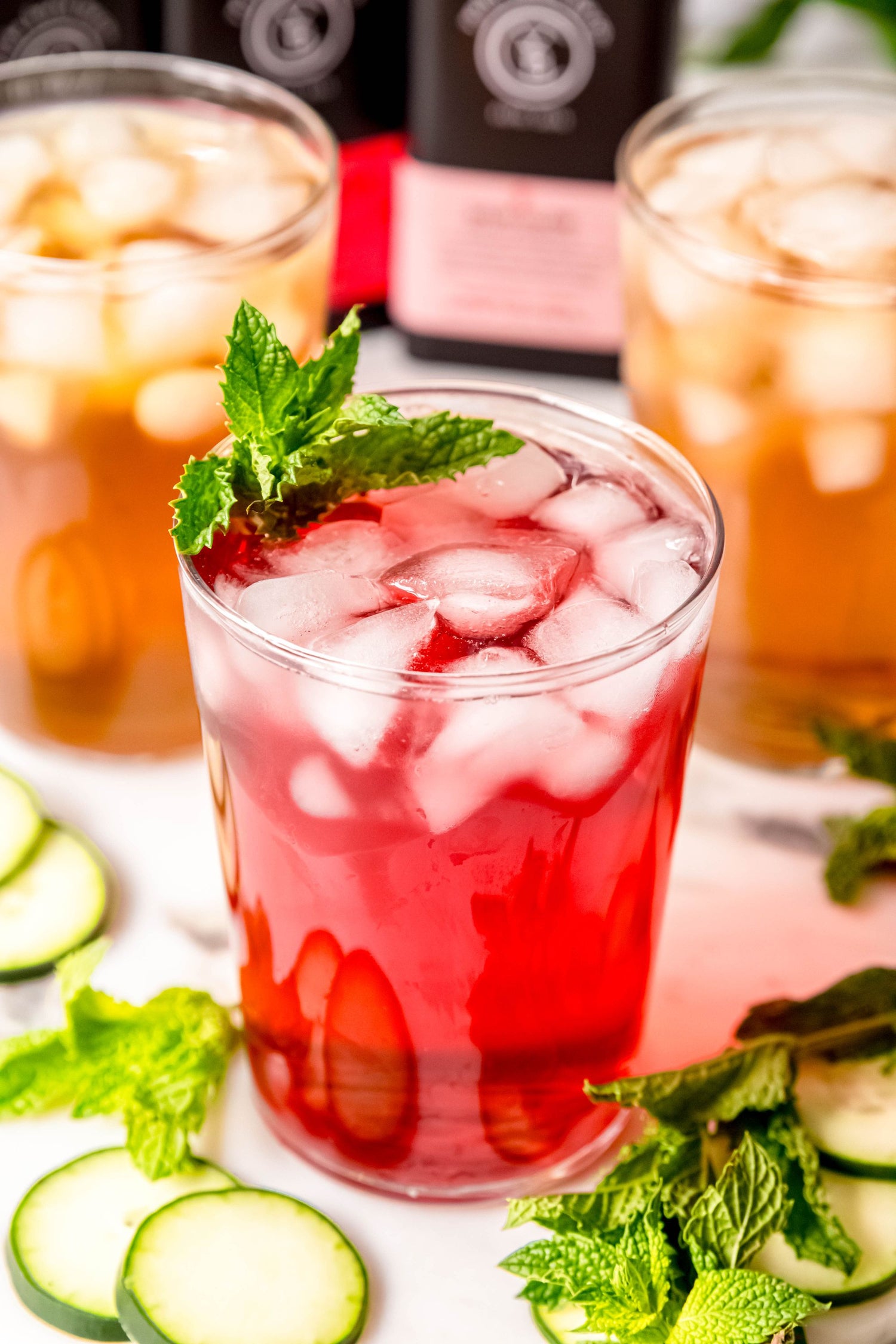 Glasses of mint iced tea with fresh mint and ice, summer refresher from Yerba Buena Tea Co