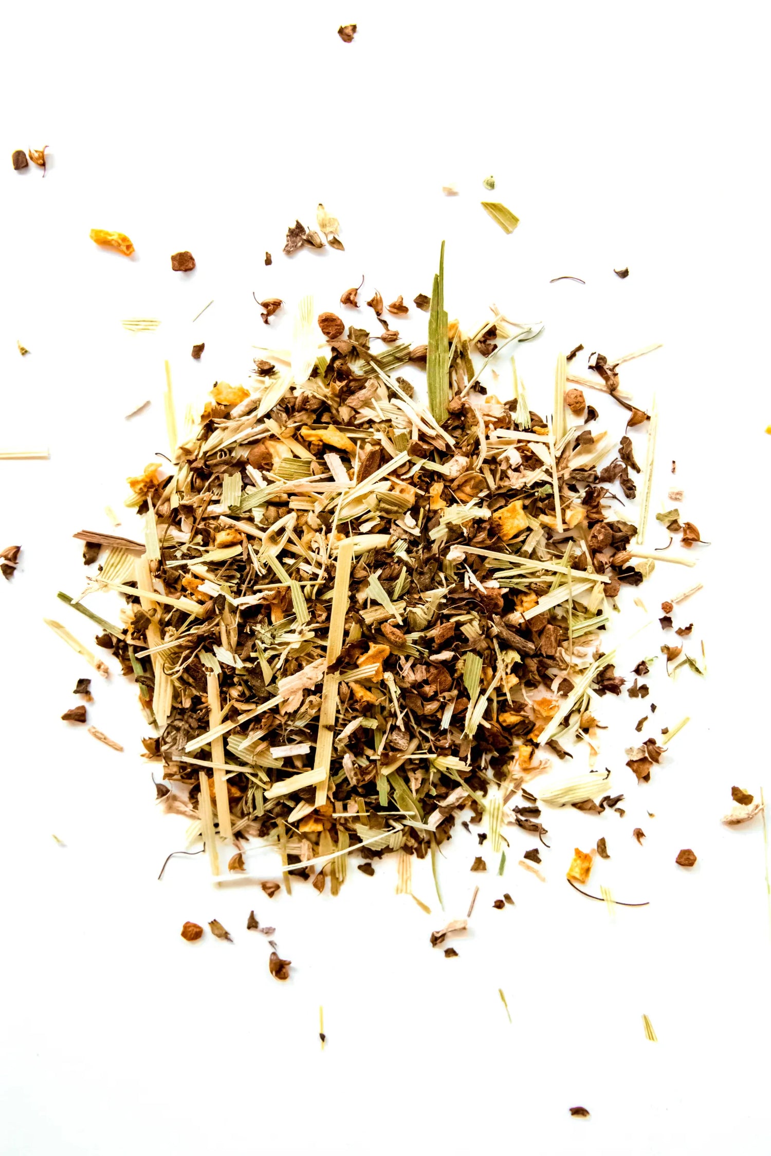 Loose leaf No Worries organic herbal tea displayed on a white background, featuring cinnamon chips, orange peel, holy basil, oat straw, wood betony, and wild crafted kava kava root. A thoughtfully balanced, caffeine-free herbal blend.