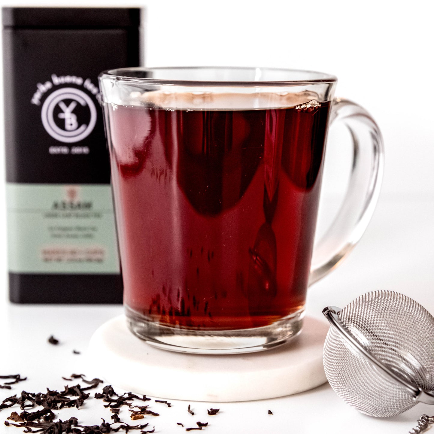 A cup of brewed Assam tea from Yerba Buena Tea Co. Deep amber hue with a rich, malty taste.