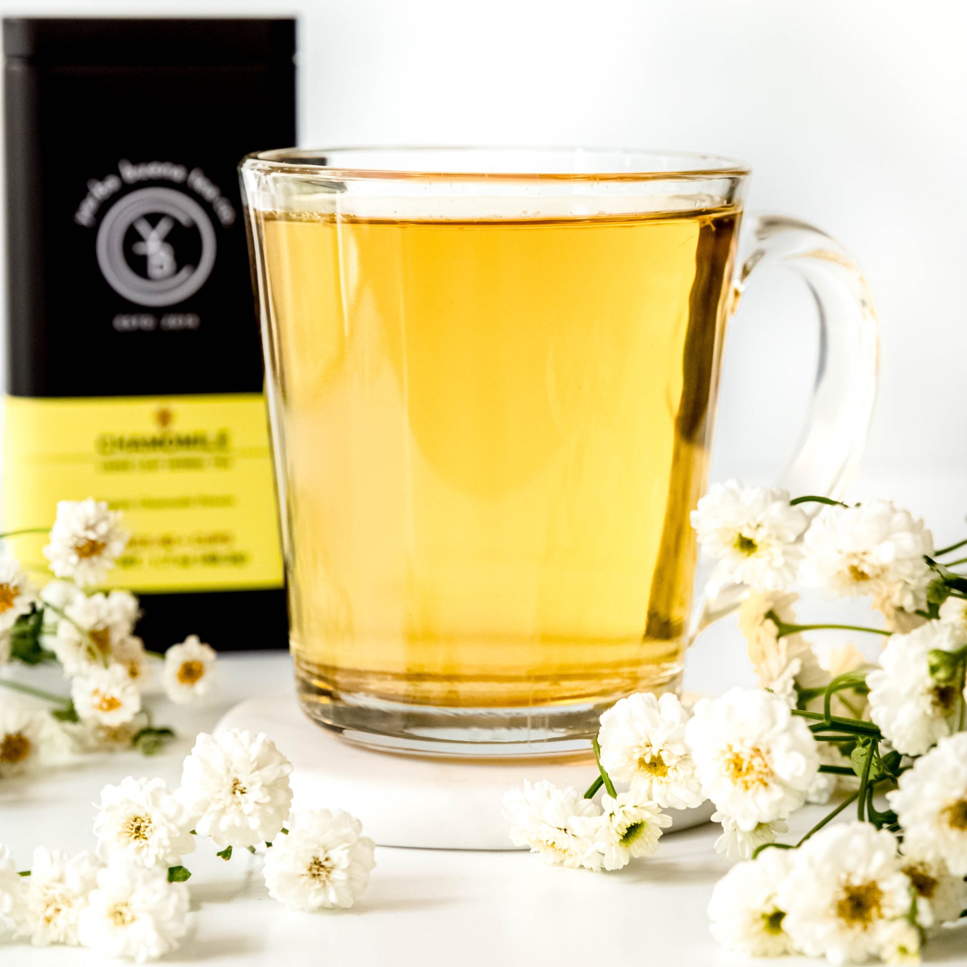 A cup of brewed Chamomile tea from Yerba Buena Tea Co. Delicate floral infusion with organic Egyptian chamomile flowers.