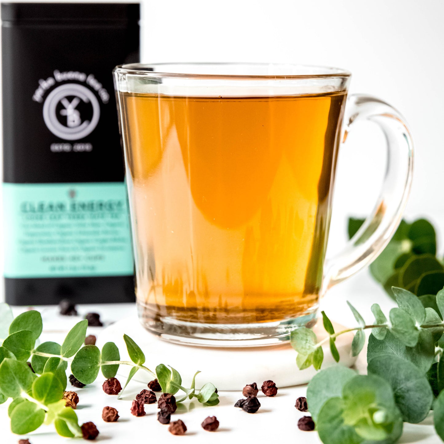 A cup of brewed Clean Energy tea from Yerba Buena Tea Co. Refreshing infusion with invigorating yerba mate and minty notes.