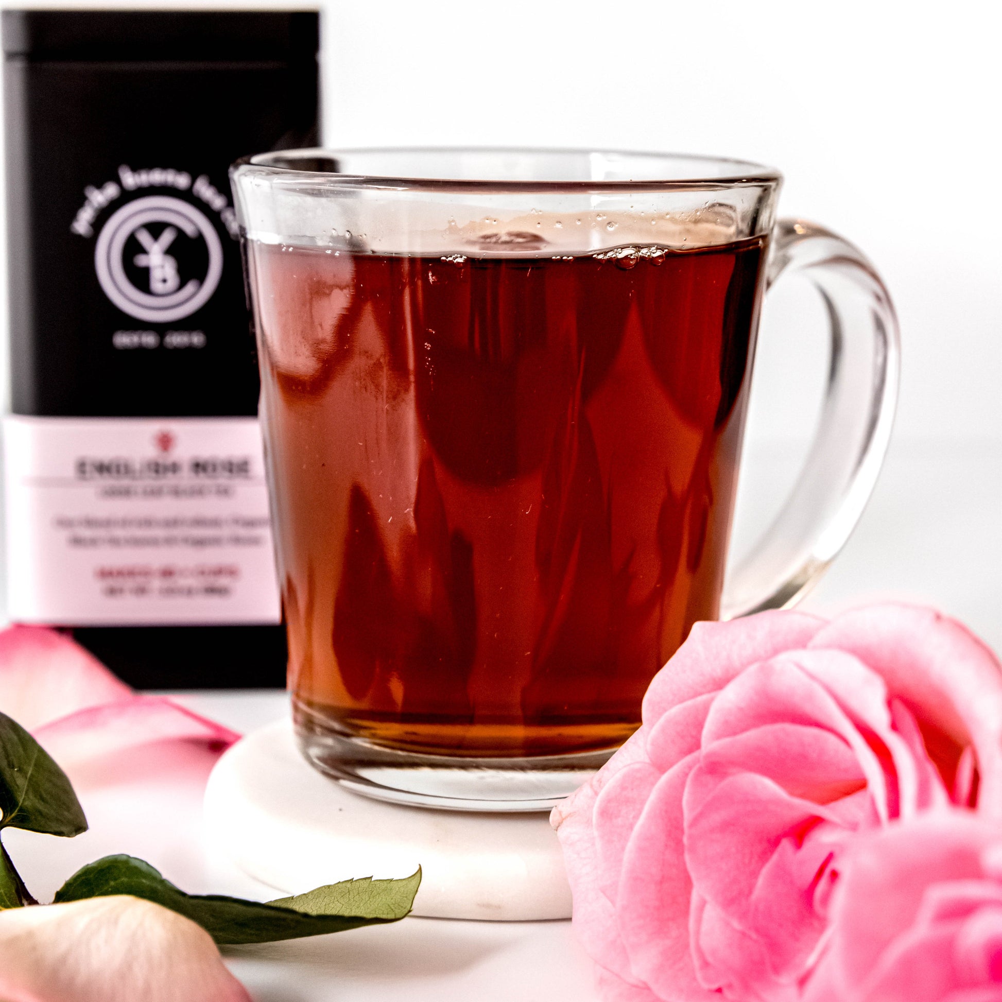 A cup of brewed English Rose tea from Yerba Buena Tea Co. Aromatic infusion with floral and robust notes.