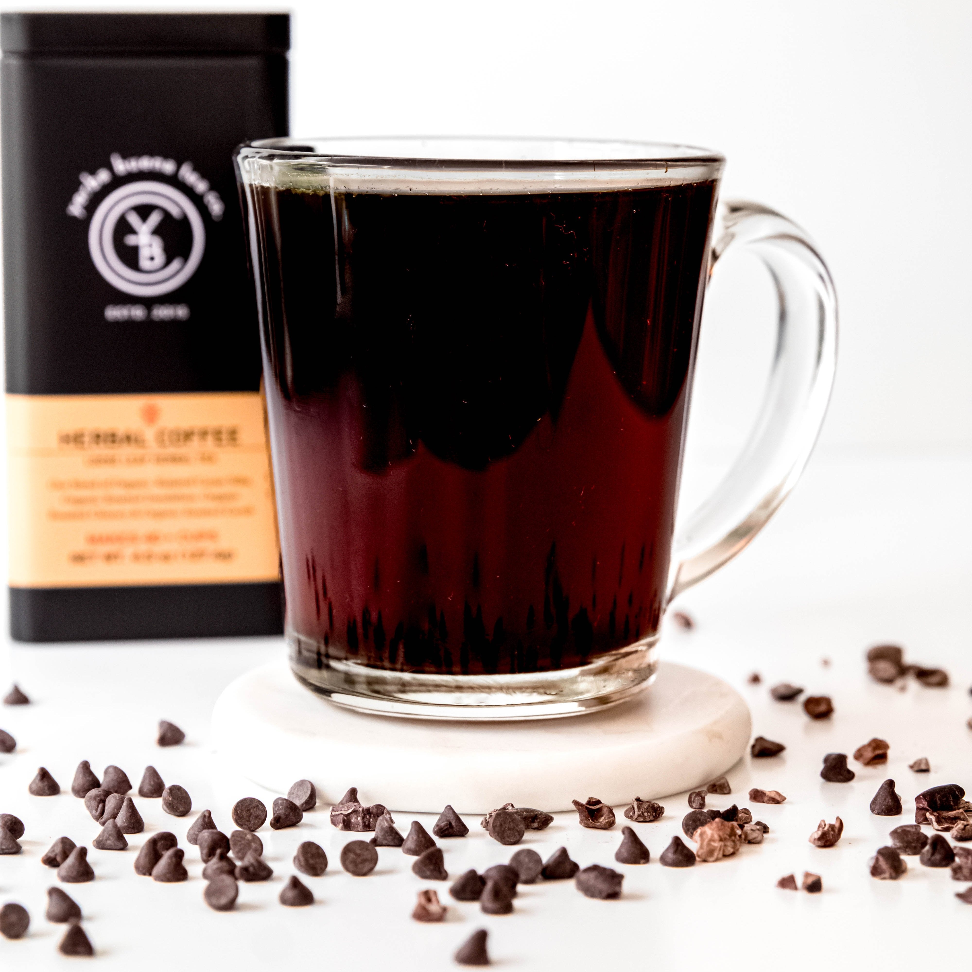 A cup of brewed Herbal Coffee with a rich, dark hue, exuding a robust, coffee-like aroma.