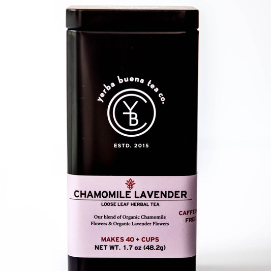 The Yerba Buena Tea Co. Chamomile Lavender tea tin, labeled with the blend’s name and ingredients, in a sleek black container with a lavender label. The text on the tin emphasizes that the blend is organic, caffeine-free, and makes 40+ cups, perfect for those seeking a relaxing tea experience.