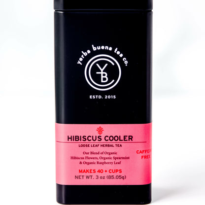 Yerba Buena Tea Co. Hibiscus Cooler loose leaf herbal tea tin. Made with organic hibiscus, spearmint, and raspberry leaf. Caffeine-free blend for a refreshing experience.