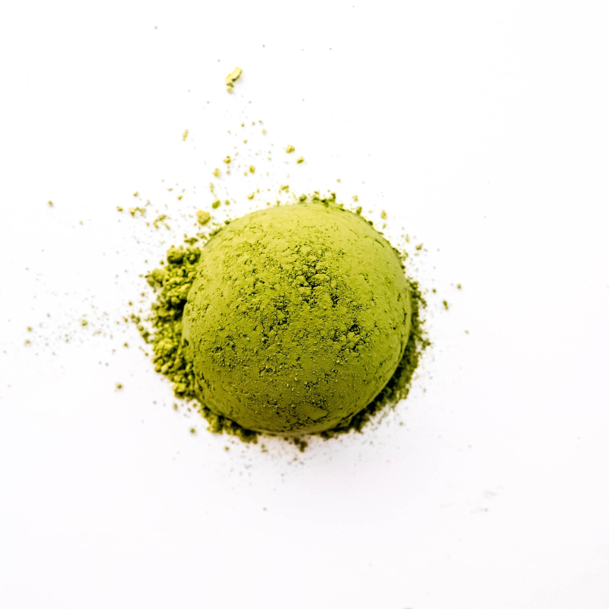 Stone-ground Ceremonial Matcha powder with a rich green hue and smooth texture.