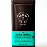 Clean Energy loose leaf yerba mate tea in dark canister with turquoise label band, by Yerba Buena Tea Company.