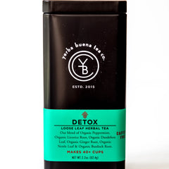 Detox loose leaf herbal tea in a black canister with turquoise label showing ingredients and brew count, by Yerba Buena Tea Company.