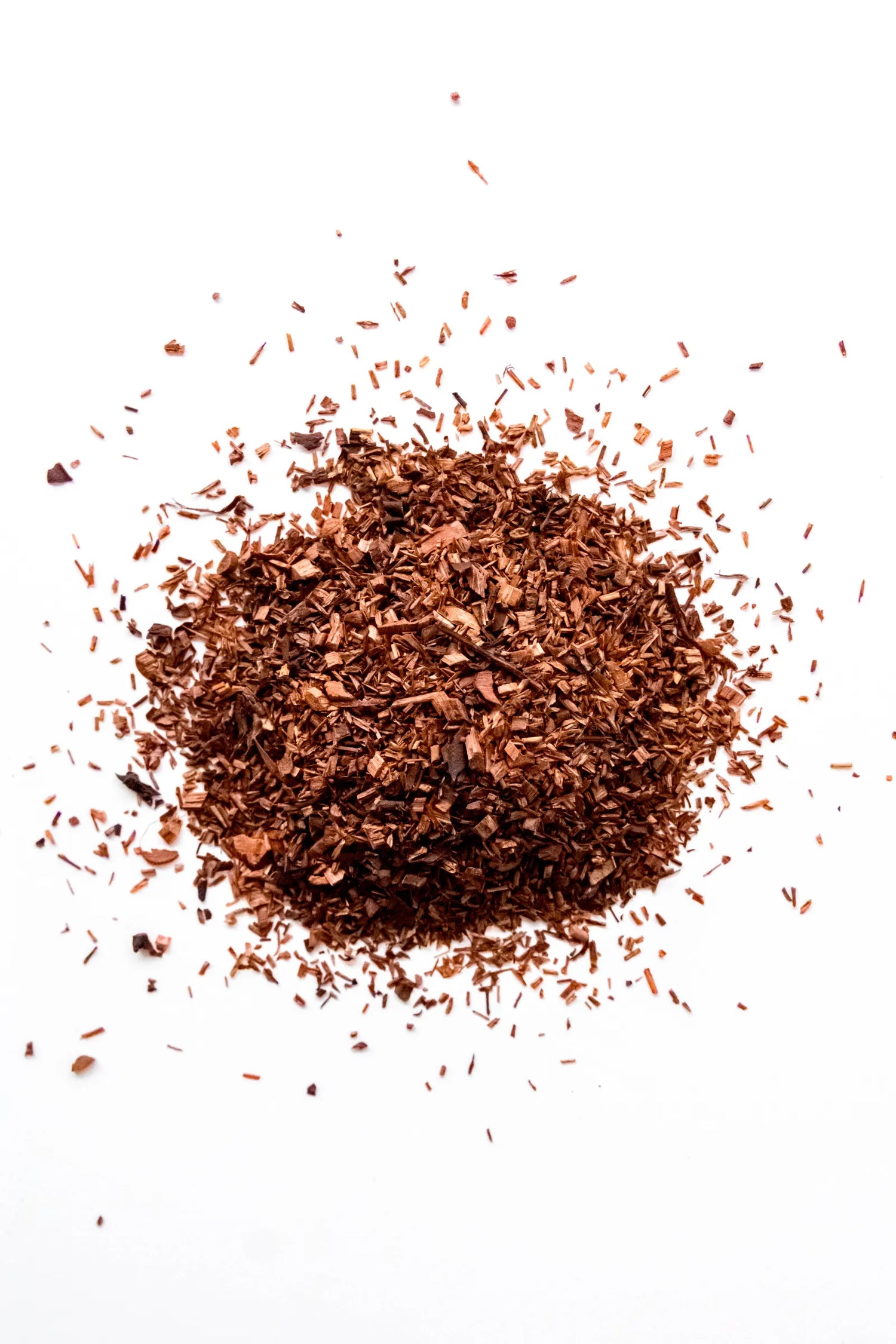 Loose leaf Honey Rooibos organic red tea displayed on a white background, featuring a blend of honeybush and red rooibos. A naturally caffeine-free loose leaf red tea handcrafted in Oregon.