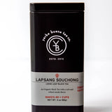 Lapsang Souchong loose leaf black tea in a sealed black canister with gray label, by Yerba Buena Tea Company.