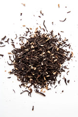 Loose leaf Lavender Grey organic black tea displayed on a white background, featuring black tea leaves blended with dried lavender flowers and organic bergamot oil. A classic floral black tea handcrafted in Oregon.