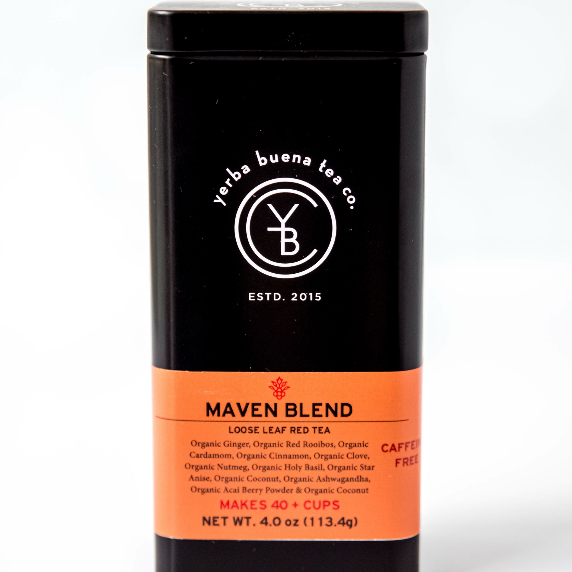 A black tin of Yerba Buena Tea Co.'s Maven Blend herbal tea, labeled as caffeine-free and made with a blend of organic rooibos, ginger, cardamom, cinnamon, cloves, nutmeg, holy basil, star anise, ashwagandha, acai berry powder, and coconut flakes, on a white background.