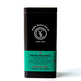 Prana Balance loose leaf herbal tea in a black canister with turquoise label band, by Yerba Buena Tea Company.