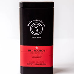 Black metal canister with red label displaying Red Rooibos loose leaf red tea, by Yerba Buena Tea Company.