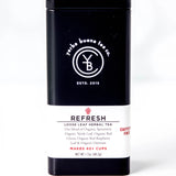Refresh loose leaf herbal tea in a black cylindrical canister with white label, by Yerba Buena Tea Company.